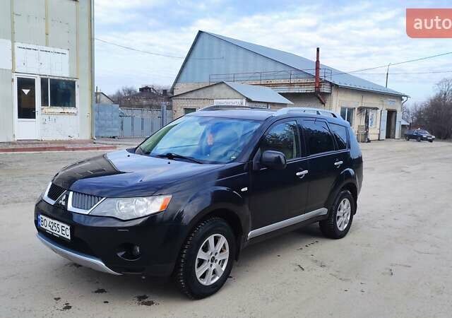 Чорний Міцубісі Аутлендер, об'ємом двигуна 2.2 л та пробігом 275 тис. км за 9900 $, фото 2 на Automoto.ua