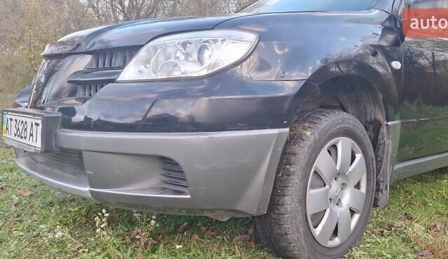Міцубісі Аутлендер 2008 у Галиче на Automoto.ua Чорний Міцубісі Аутлендер, об'ємом двигуна 2 л та пробігом 112 тис. км за 7350 $, фото 21 на Automoto.ua