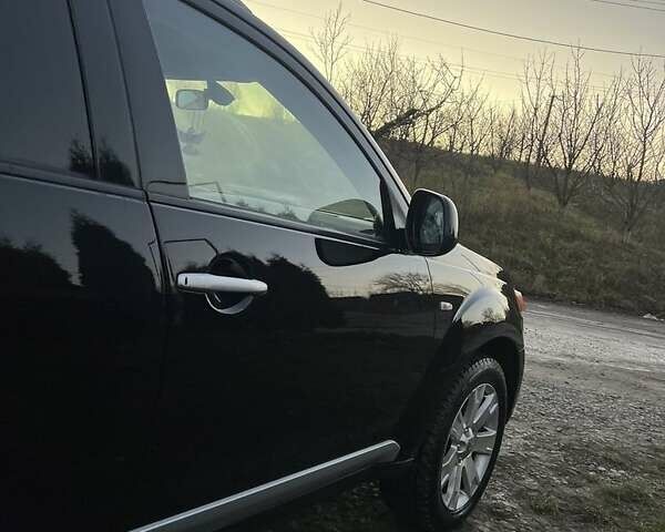 Черный Мицубиси Аутлендер, объемом двигателя 2.2 л и пробегом 310 тыс. км за 9700 $, фото 6 на Automoto.ua