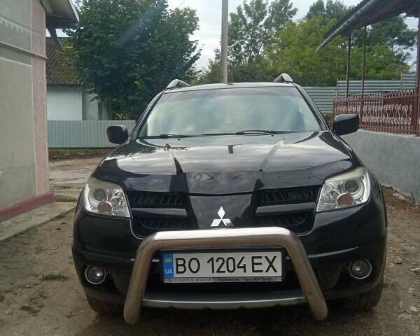 Чорний Міцубісі Аутлендер, об'ємом двигуна 2 л та пробігом 208 тис. км за 6700 $, фото 8 на Automoto.ua