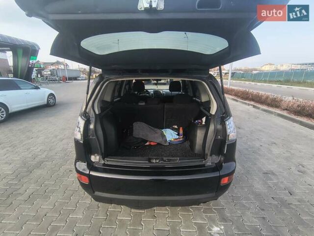 Черный Мицубиси Аутлендер, объемом двигателя 2.4 л и пробегом 238 тыс. км за 8900 $, фото 8 на Automoto.ua