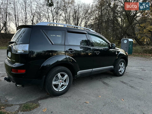 Чорний Міцубісі Аутлендер, об'ємом двигуна 1.97 л та пробігом 300 тис. км за 8600 $, фото 3 на Automoto.ua