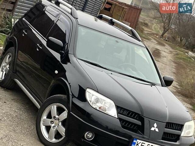 Черный Мицубиси Аутлендер, объемом двигателя 2.4 л и пробегом 178 тыс. км за 6900 $, фото 7 на Automoto.ua