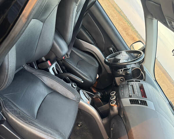 Чорний Міцубісі Аутлендер, об'ємом двигуна 3 л та пробігом 236 тис. км за 9800 $, фото 6 на Automoto.ua