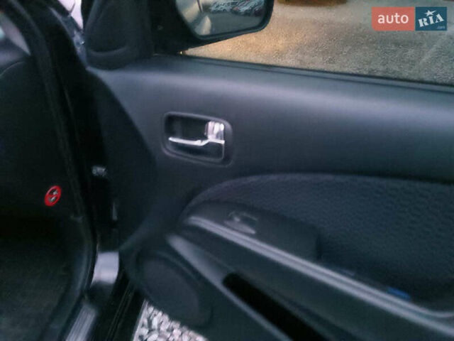 Чорний Міцубісі Аутлендер, об'ємом двигуна 2 л та пробігом 271 тис. км за 6940 $, фото 21 на Automoto.ua
