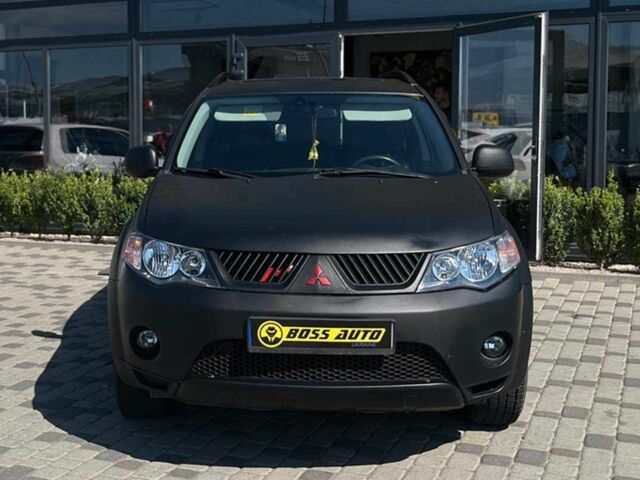 Черный Мицубиси Аутлендер, объемом двигателя 3 л и пробегом 308 тыс. км за 7600 $, фото 1 на Automoto.ua