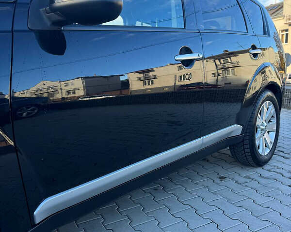 Черный Мицубиси Аутлендер, объемом двигателя 1.97 л и пробегом 202 тыс. км за 9700 $, фото 1 на Automoto.ua