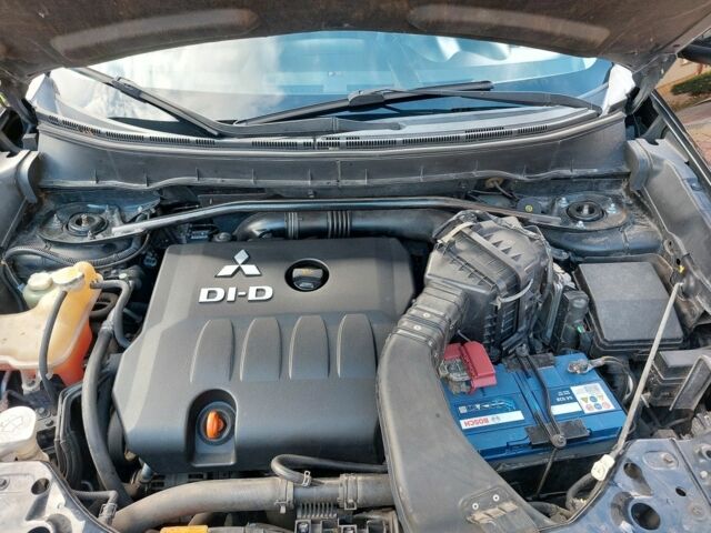 Черный Мицубиси Аутлендер, объемом двигателя 2 л и пробегом 249 тыс. км за 8750 $, фото 13 на Automoto.ua