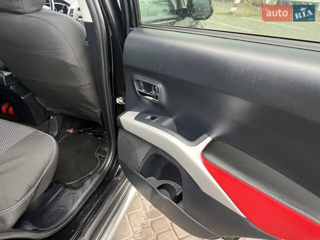 Черный Мицубиси Аутлендер, объемом двигателя 2.4 л и пробегом 230 тыс. км за 6650 $, фото 45 на Automoto.ua