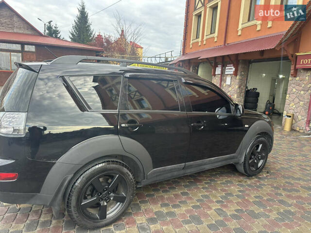 Черный Мицубиси Аутлендер, объемом двигателя 2.4 л и пробегом 199 тыс. км за 8777 $, фото 4 на Automoto.ua