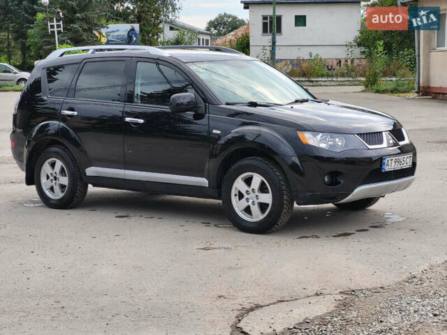 Чорний Міцубісі Аутлендер, об'ємом двигуна 2.4 л та пробігом 205 тис. км за 8400 $, фото 3 на Automoto.ua