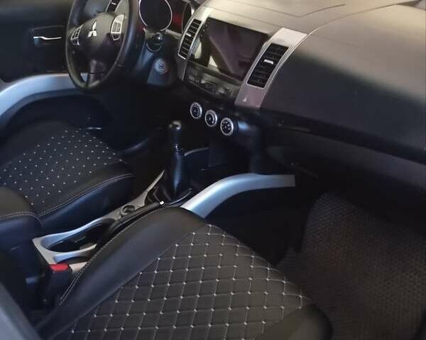 Черный Мицубиси Аутлендер, объемом двигателя 2.35 л и пробегом 245 тыс. км за 8000 $, фото 15 на Automoto.ua