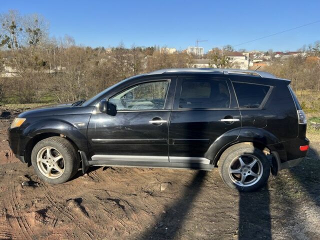 Черный Мицубиси Аутлендер, объемом двигателя 2 л и пробегом 247 тыс. км за 4600 $, фото 9 на Automoto.ua