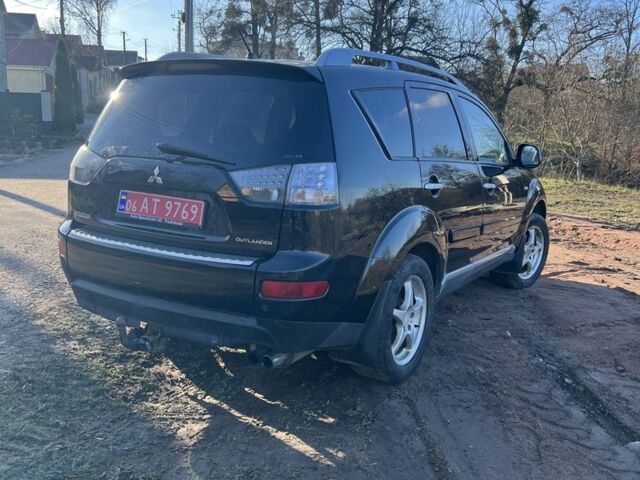 Черный Мицубиси Аутлендер, объемом двигателя 2 л и пробегом 247 тыс. км за 4600 $, фото 11 на Automoto.ua