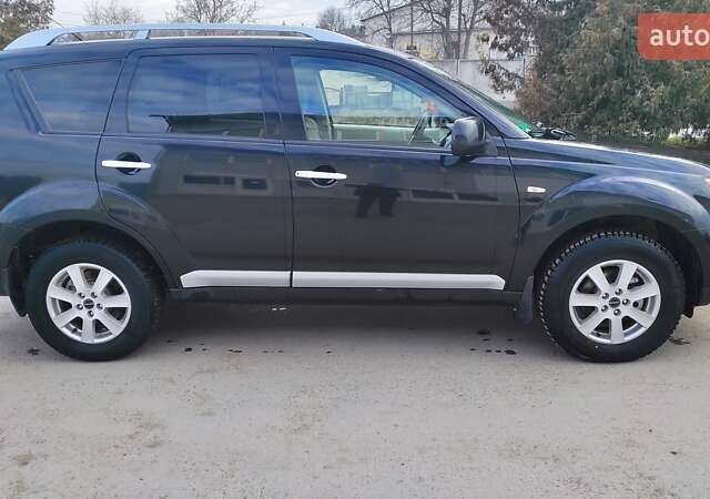 Чорний Міцубісі Аутлендер, об'ємом двигуна 2.2 л та пробігом 275 тис. км за 9900 $, фото 3 на Automoto.ua