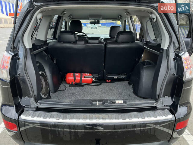 Черный Мицубиси Аутлендер, объемом двигателя 1.97 л и пробегом 244 тыс. км за 8800 $, фото 17 на Automoto.ua