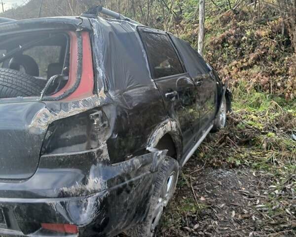 Черный Мицубиси Аутлендер, объемом двигателя 2.38 л и пробегом 270 тыс. км за 1700 $, фото 2 на Automoto.ua