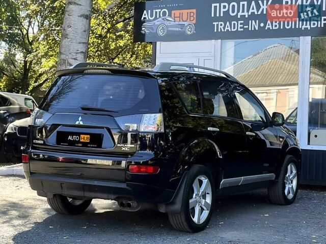 Черный Мицубиси Аутлендер, объемом двигателя 3 л и пробегом 230 тыс. км за 9900 $, фото 7 на Automoto.ua