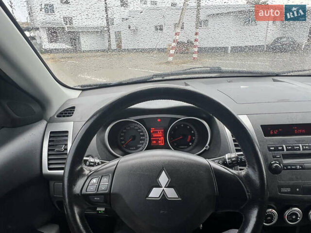 Черный Мицубиси Аутлендер, объемом двигателя 2.4 л и пробегом 230 тыс. км за 6650 $, фото 29 на Automoto.ua