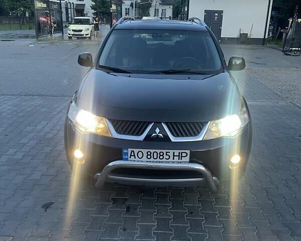 Черный Мицубиси Аутлендер, объемом двигателя 2.4 л и пробегом 290 тыс. км за 9500 $, фото 10 на Automoto.ua