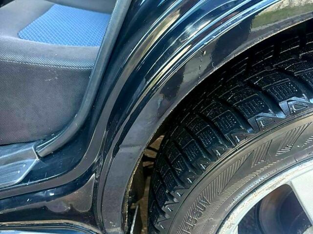 Черный Мицубиси Аутлендер, объемом двигателя 2.4 л и пробегом 231 тыс. км за 8500 $, фото 7 на Automoto.ua