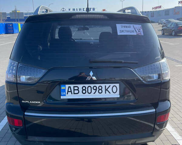 Чорний Міцубісі Аутлендер, об'ємом двигуна 2.4 л та пробігом 195 тис. км за 8600 $, фото 4 на Automoto.ua