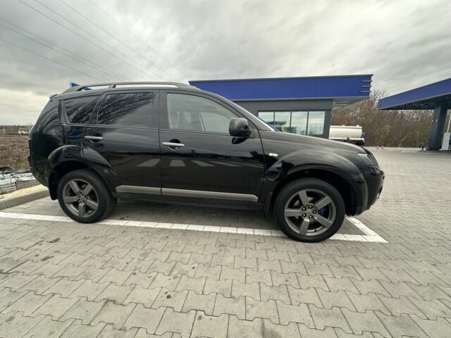 Чорний Міцубісі Аутлендер, об'ємом двигуна 2.4 л та пробігом 218 тис. км за 10000 $, фото 12 на Automoto.ua