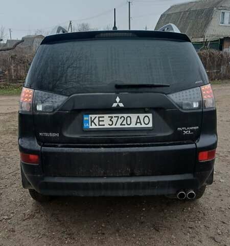 Черный Мицубиси Аутлендер, объемом двигателя 3 л и пробегом 152 тыс. км за 8700 $, фото 4 на Automoto.ua