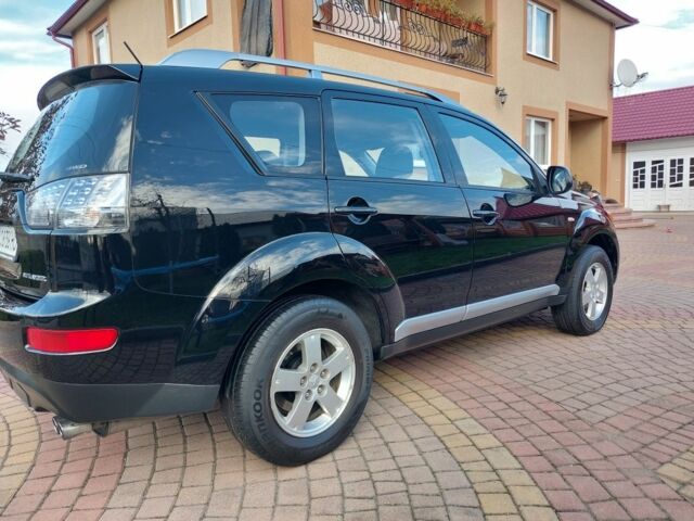 Черный Мицубиси Аутлендер, объемом двигателя 2 л и пробегом 249 тыс. км за 8750 $, фото 5 на Automoto.ua