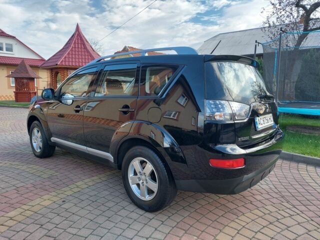 Черный Мицубиси Аутлендер, объемом двигателя 2 л и пробегом 249 тыс. км за 8750 $, фото 4 на Automoto.ua