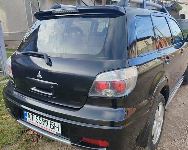 Міцубісі Аутлендер 2008 у Івано-Франківську на Automoto.ua Чорний Міцубісі Аутлендер, об'ємом двигуна 2 л та пробігом 128 тис. км за 7000 $, фото 18 на Automoto.ua