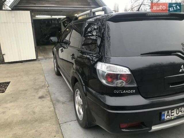 Чорний Міцубісі Аутлендер, об'ємом двигуна 2.38 л та пробігом 207 тис. км за 7000 $, фото 5 на Automoto.ua