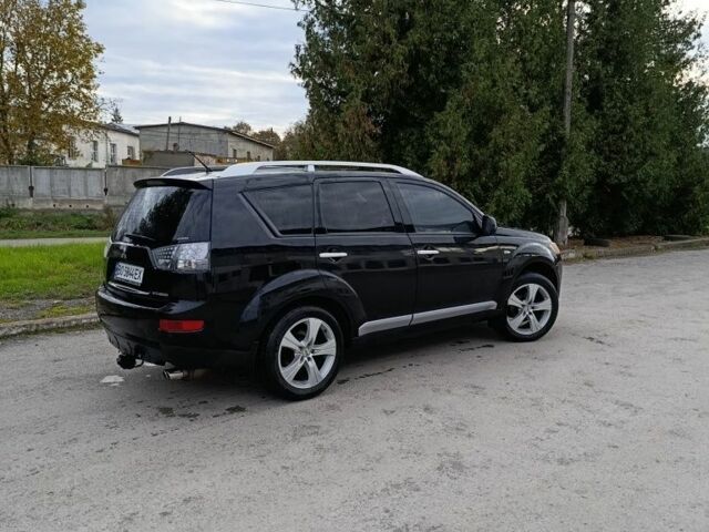 Черный Мицубиси Аутлендер, объемом двигателя 2.2 л и пробегом 200 тыс. км за 9500 $, фото 3 на Automoto.ua