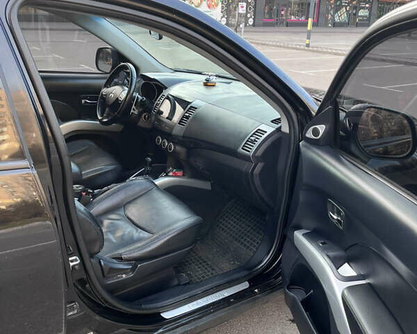 Черный Мицубиси Аутлендер, объемом двигателя 2.4 л и пробегом 237 тыс. км за 5000 $, фото 15 на Automoto.ua