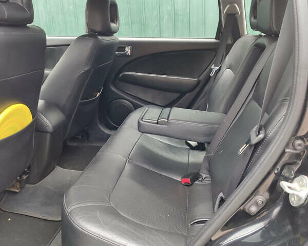 Чорний Міцубісі Аутлендер, об'ємом двигуна 2.4 л та пробігом 200 тис. км за 6790 $, фото 9 на Automoto.ua