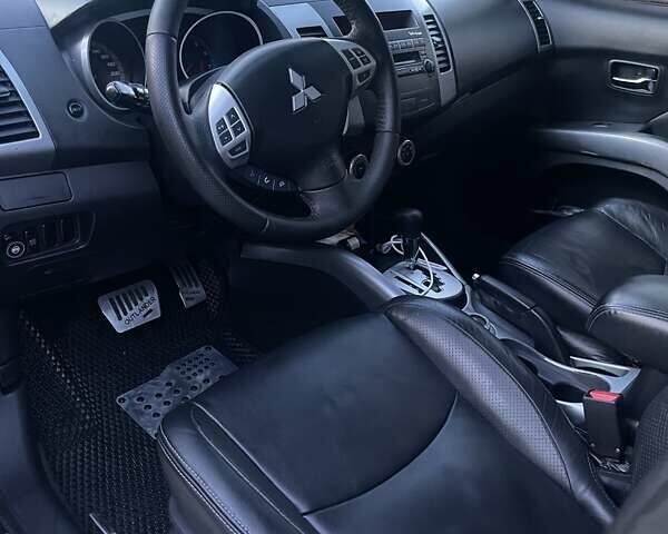 Черный Мицубиси Аутлендер, объемом двигателя 2.4 л и пробегом 290 тыс. км за 9500 $, фото 18 на Automoto.ua