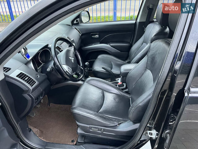 Черный Мицубиси Аутлендер, объемом двигателя 1.97 л и пробегом 244 тыс. км за 8800 $, фото 8 на Automoto.ua