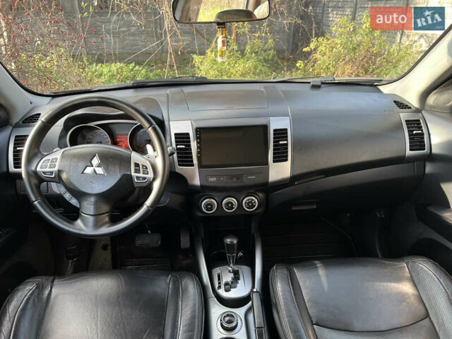 Чорний Міцубісі Аутлендер, об'ємом двигуна 2.4 л та пробігом 221 тис. км за 8700 $, фото 18 на Automoto.ua