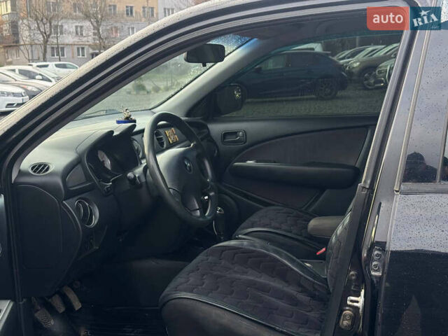 Черный Мицубиси Аутлендер, объемом двигателя 2 л и пробегом 240 тыс. км за 5500 $, фото 7 на Automoto.ua