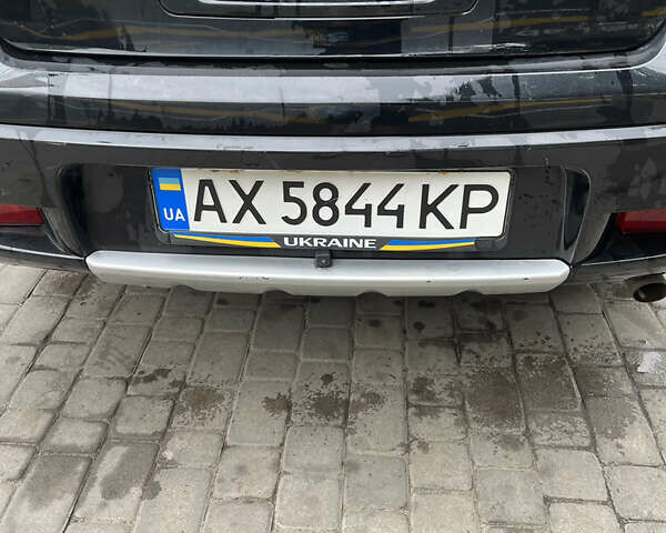Чорний Міцубісі Аутлендер, об'ємом двигуна 2.38 л та пробігом 218 тис. км за 8300 $, фото 3 на Automoto.ua