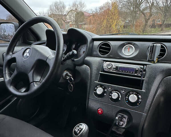 Чорний Міцубісі Аутлендер, об'ємом двигуна 2 л та пробігом 118 тис. км за 8100 $, фото 35 на Automoto.ua