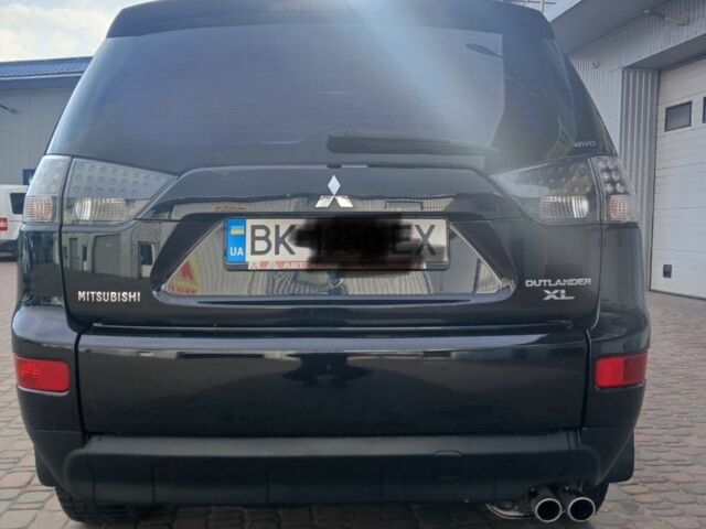 Чорний Міцубісі Аутлендер, об'ємом двигуна 3 л та пробігом 300 тис. км за 9600 $, фото 7 на Automoto.ua