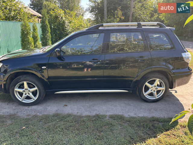 Міцубісі Аутлендер 2008 у Києві на Automoto.ua Чорний Міцубісі Аутлендер, об'ємом двигуна 2 л та пробігом 228 тис. км за 7300 $, фото 7 на Automoto.ua