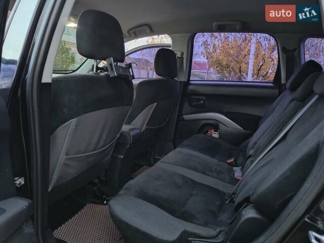 Черный Мицубиси Аутлендер, объемом двигателя 2.36 л и пробегом 192 тыс. км за 8800 $, фото 11 на Automoto.ua