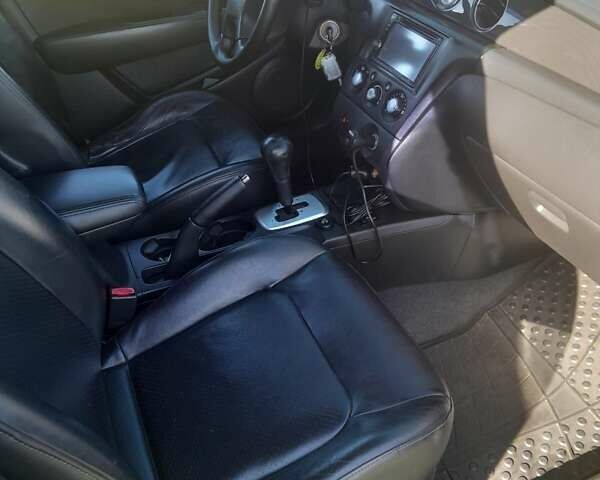 Чорний Міцубісі Аутлендер, об'ємом двигуна 2.38 л та пробігом 161 тис. км за 7500 $, фото 3 на Automoto.ua