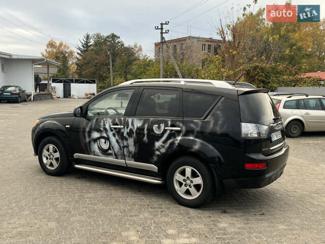 Черный Мицубиси Аутлендер, объемом двигателя 2.4 л и пробегом 230 тыс. км за 6650 $, фото 8 на Automoto.ua