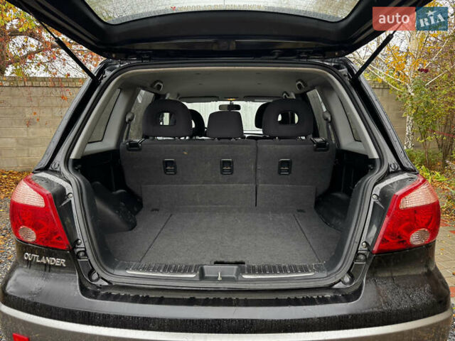 Чорний Міцубісі Аутлендер, об'ємом двигуна 2 л та пробігом 254 тис. км за 7499 $, фото 22 на Automoto.ua