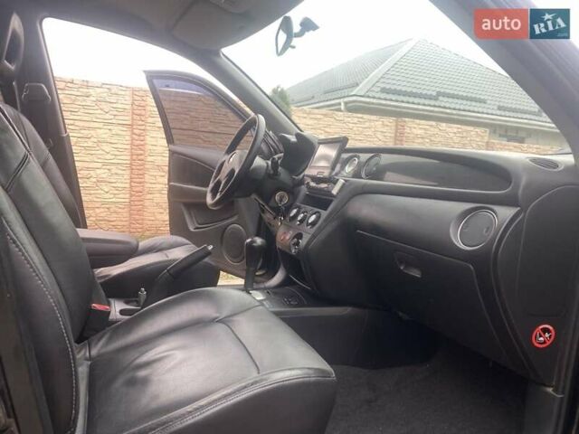 Черный Мицубиси Аутлендер, объемом двигателя 2.4 л и пробегом 178 тыс. км за 6900 $, фото 20 на Automoto.ua