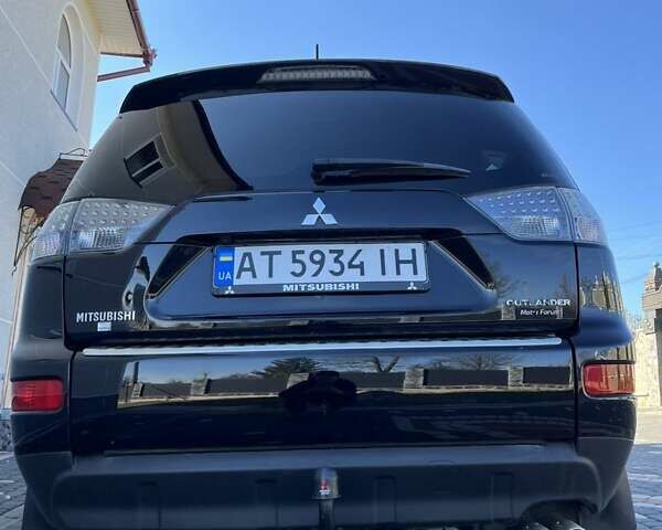 Чорний Міцубісі Аутлендер, об'ємом двигуна 1.97 л та пробігом 189 тис. км за 9350 $, фото 2 на Automoto.ua