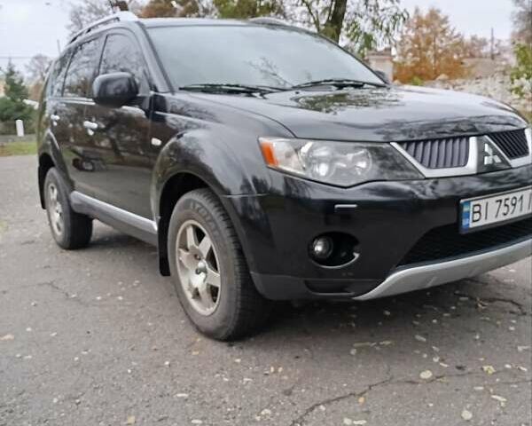 Чорний Міцубісі Аутлендер, об'ємом двигуна 2.36 л та пробігом 265 тис. км за 8800 $, фото 15 на Automoto.ua